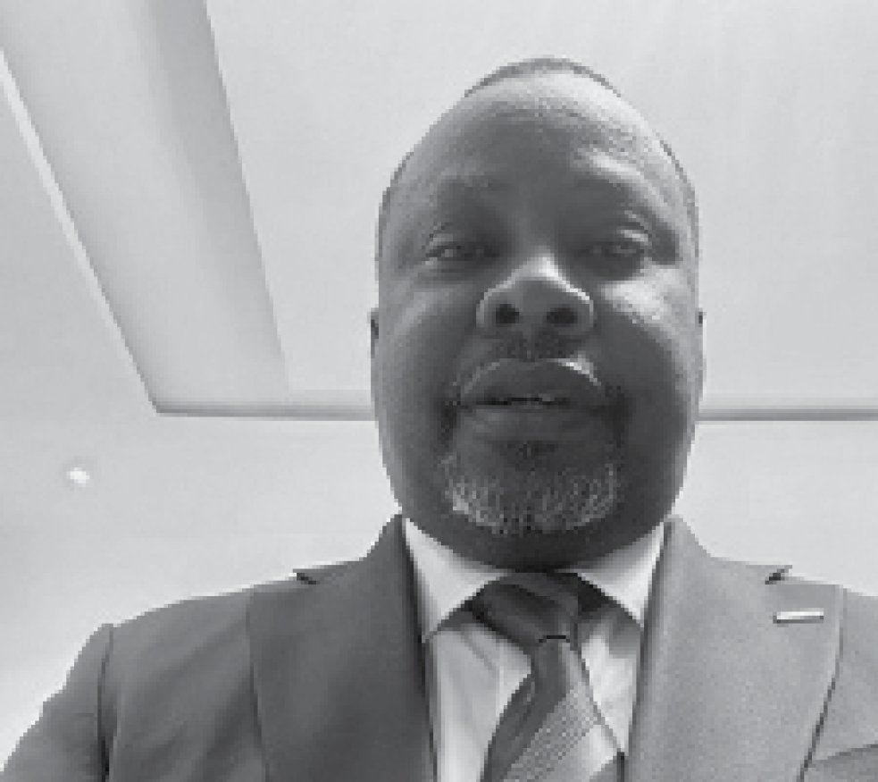 An Estate Surveyor and Valuer ESV Amos Kassim