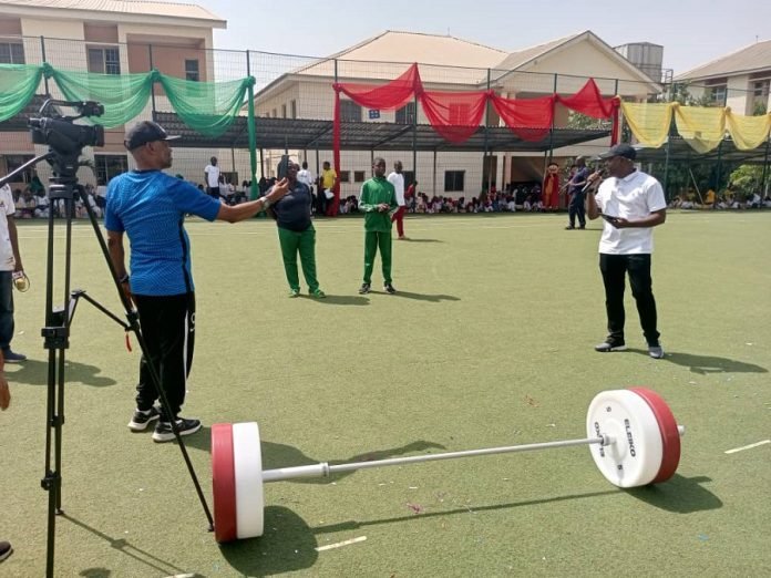 NWF begins grassroots campaign, conducts weightlifting demonstration in school