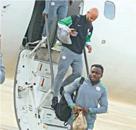 Coach Chelle and Moses Simon disembarking from the plane on Sunday morning