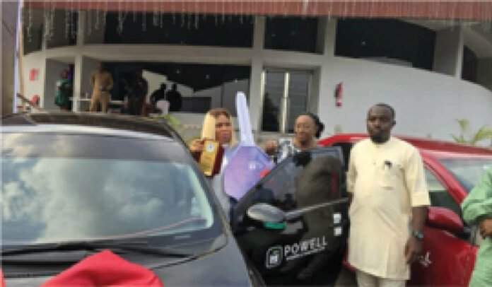 Powell Ambassador, Patience Ozokwor gifting one of the Cars to a realtor
