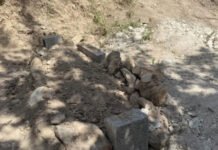 His father had just been buried. Then West Bank settlers forced him to dig up the body